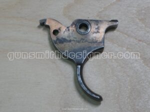 Vu du coté droit de la queue de détente du revolver 1892.