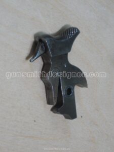 Le percuteur et le mentonnet du revolver 1892.